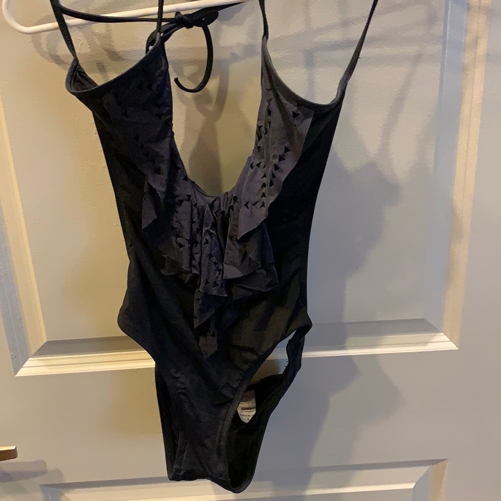 LSpace deep plunge ruffed one piece open back